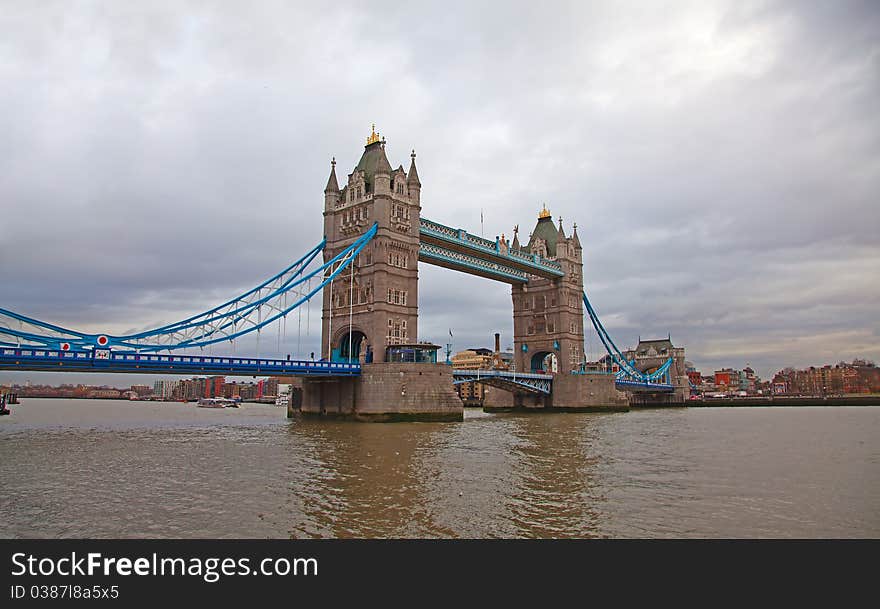 Tower bridge under cloudy winter sky. London. UK.