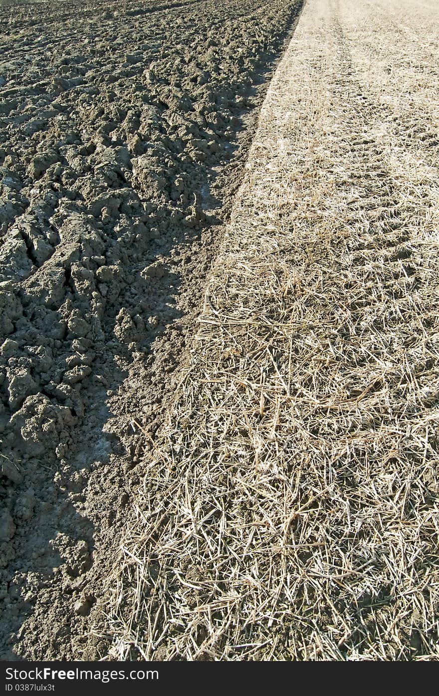 Acre and stubble field side by side