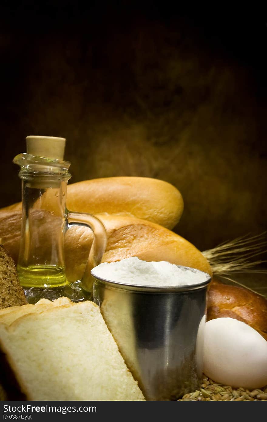 Bread and bakery products on wood background