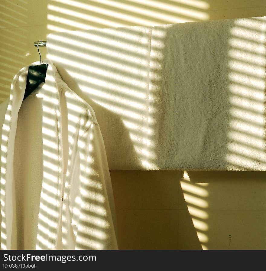 Cotton Bathrobes and the shadow of Blind. i like the shadow and the bathrobes.