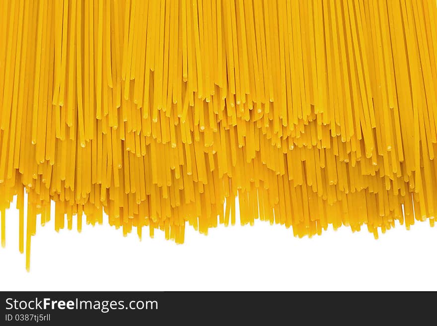 Dry Italian spaghetti pasta as a background