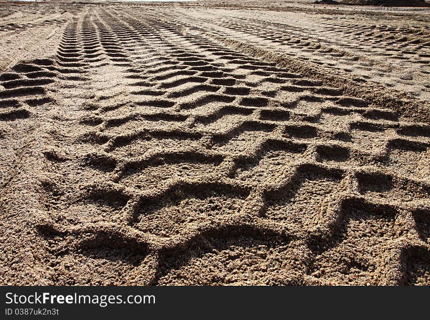 Trails of a dredger in the sand