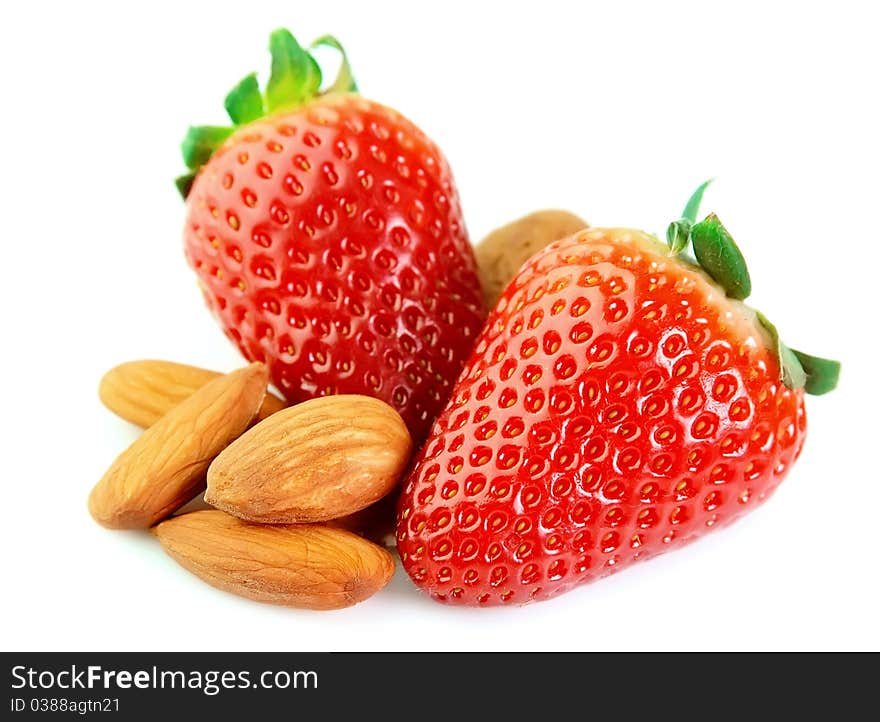 Strawberry with almonds on a white background