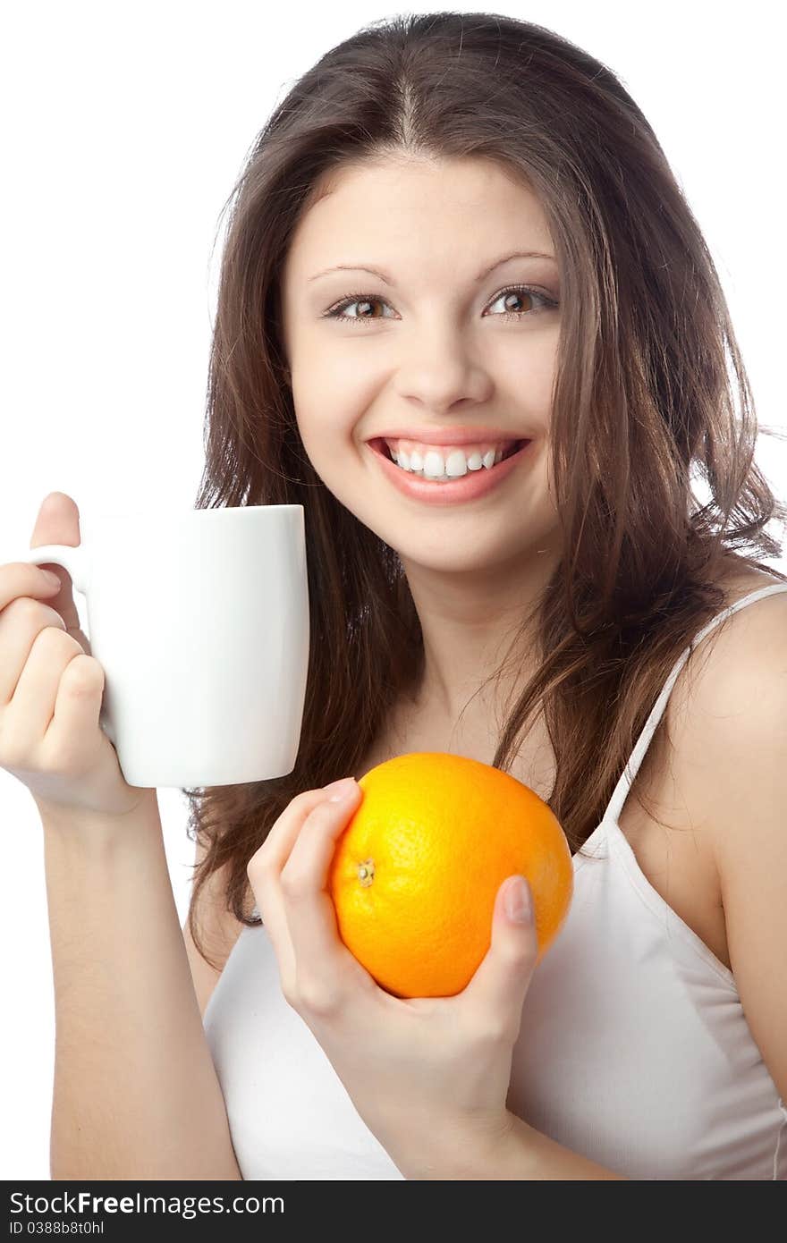 Beautiful young woman holding an orange. Close up. Beautiful young woman holding an orange. Close up