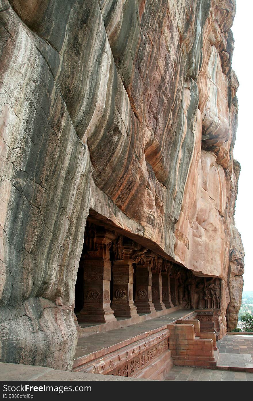 Cave temple cut under gigantic rock at Badami, Karnataka, India, Asia. Cave temple cut under gigantic rock at Badami, Karnataka, India, Asia