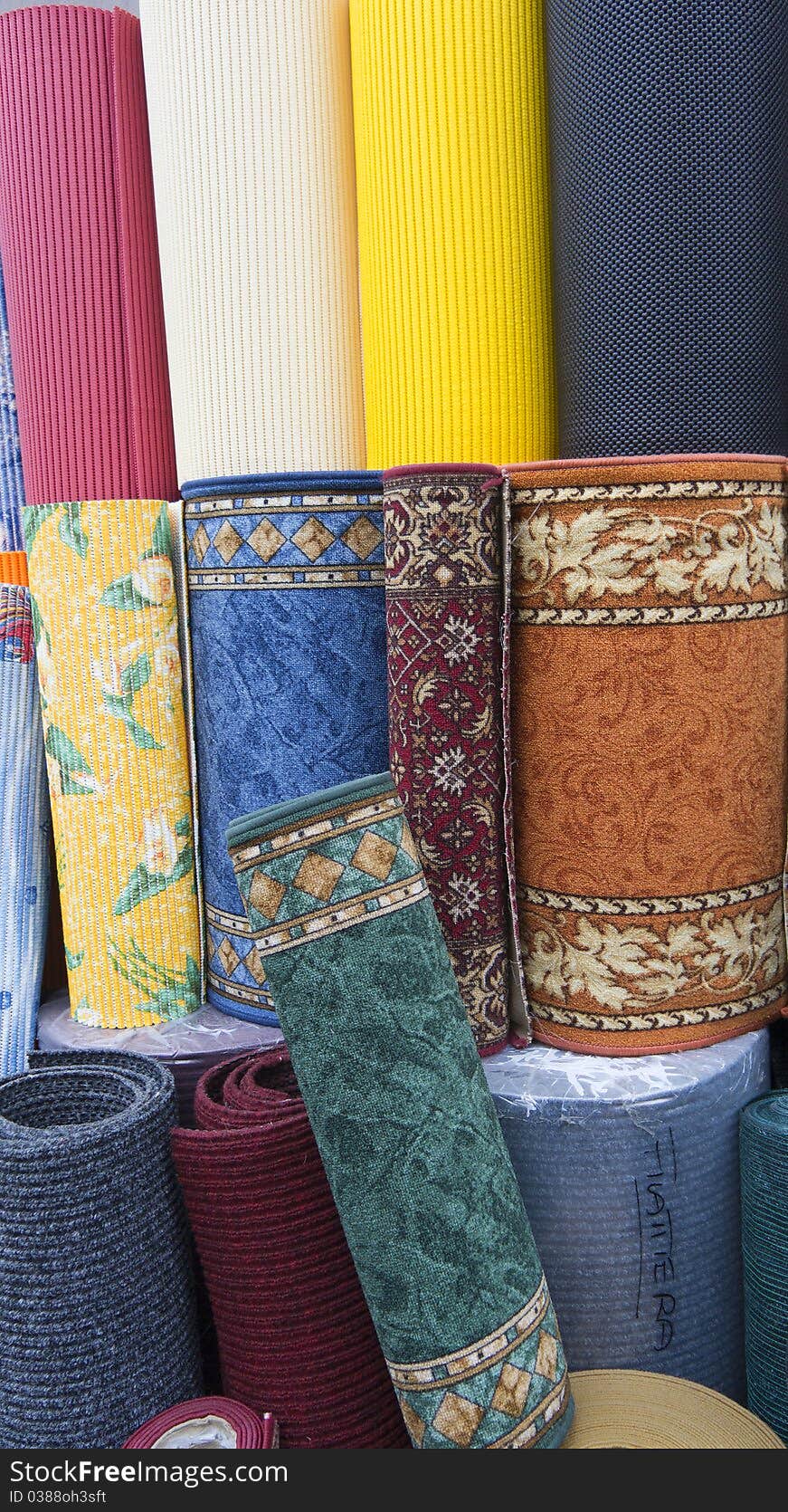 COLORED ROLLED CARPETS AT MARKET PLACE. COLORED ROLLED CARPETS AT MARKET PLACE