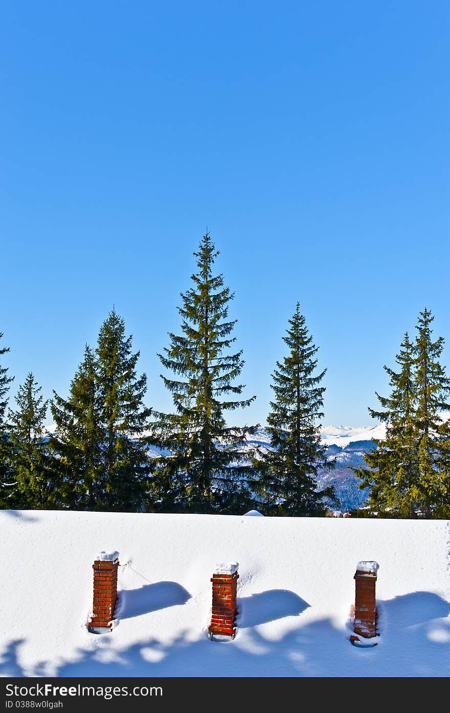 Roof house with three chimneys