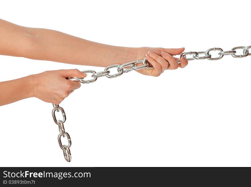 Woman pulling a long heavy metal chain