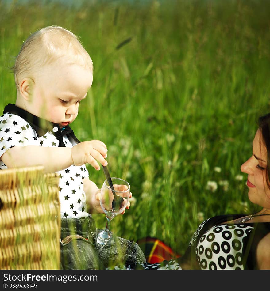 Picnic of happy family on green grass. Picnic of happy family on green grass