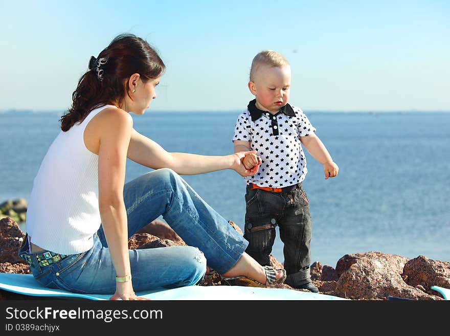 Picnic of happy family near sea. Picnic of happy family near sea