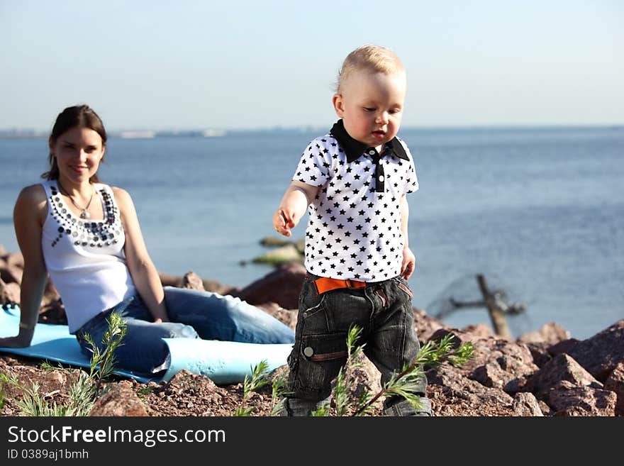 Picnic of happy family near sea. Picnic of happy family near sea