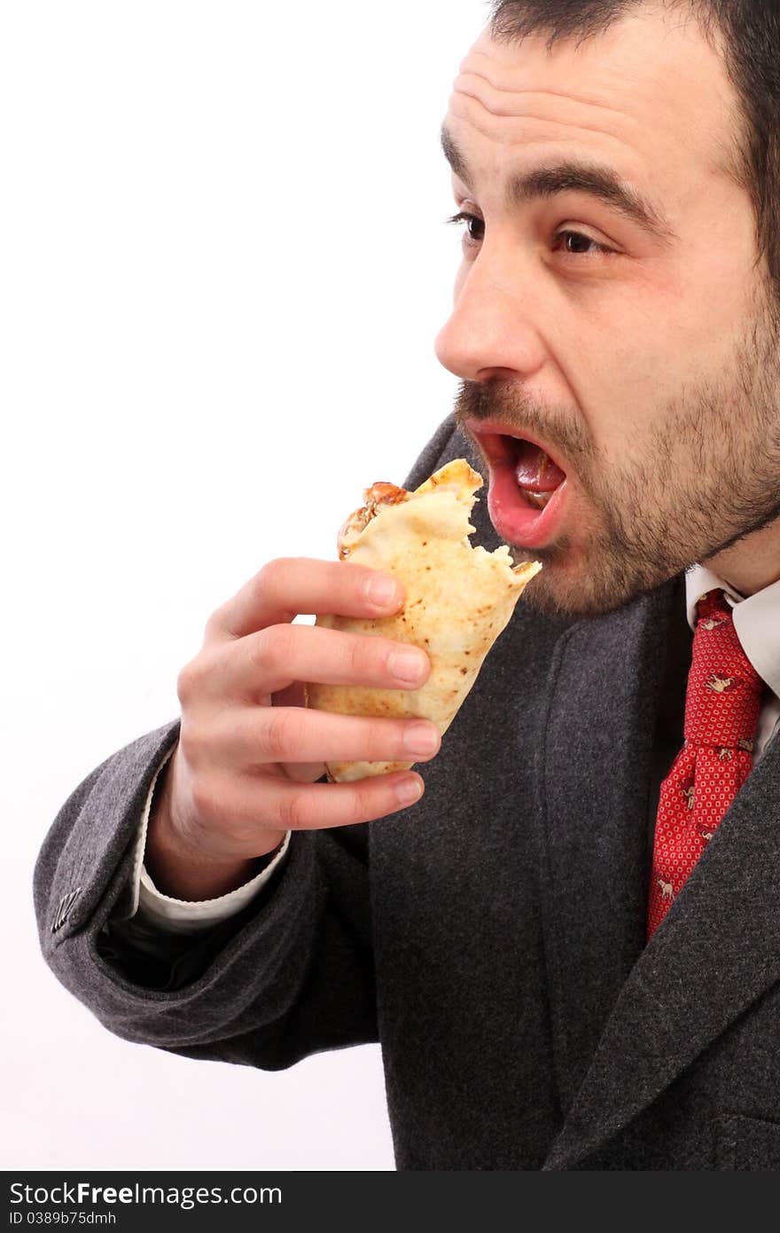 Image of busy man eating breakfast