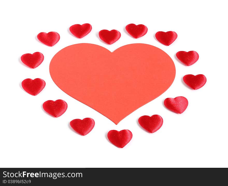 Large red heart surrounded by small hearts isolated on white background