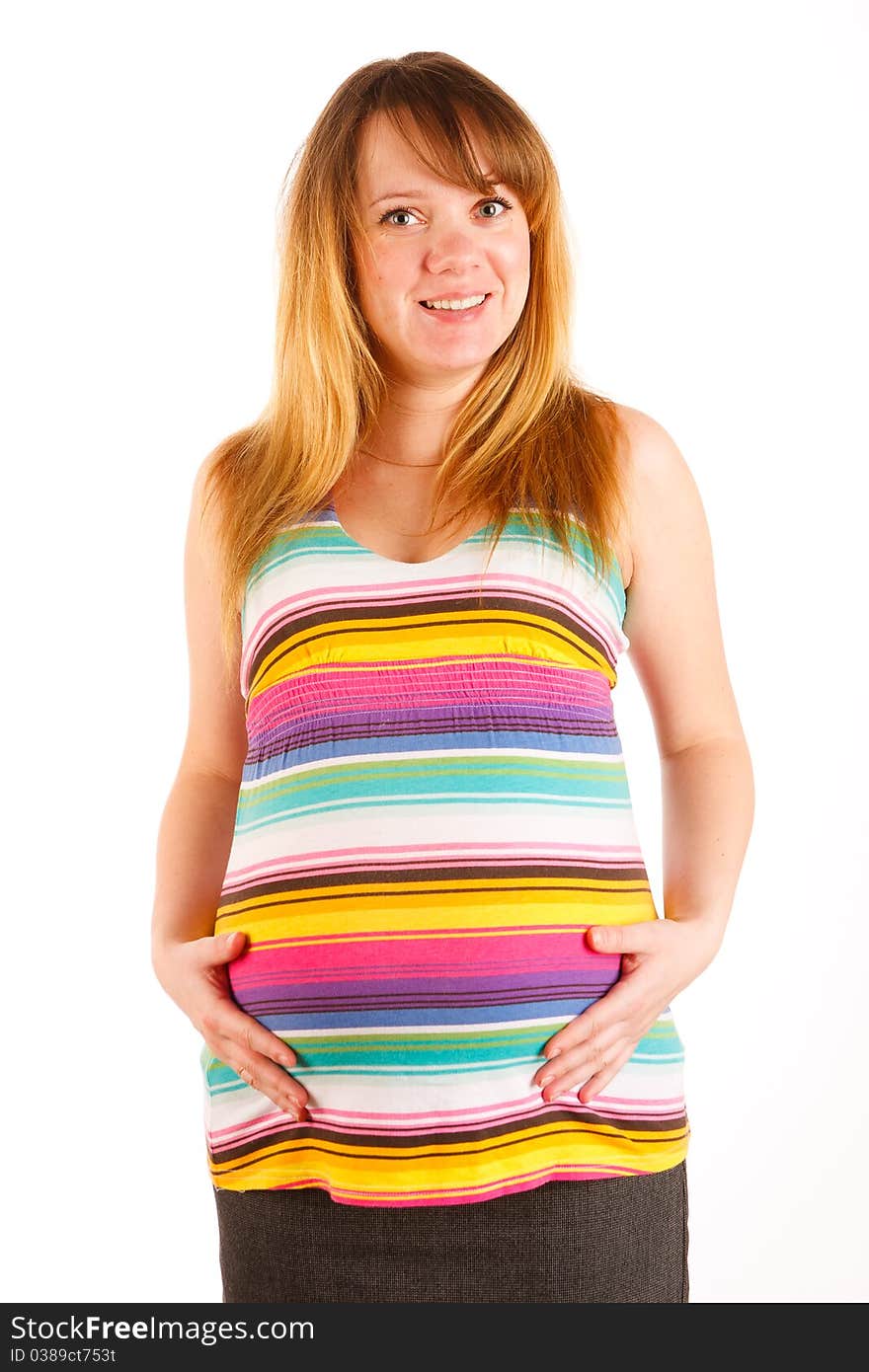 Beautiful pregnant woman staying on white background