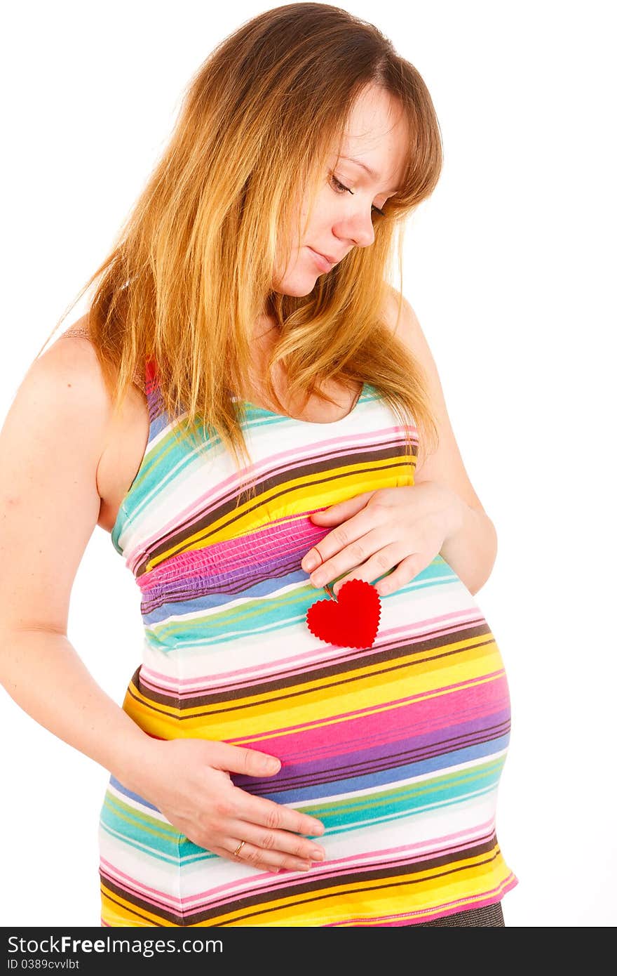 Beautiful pregnant woman staying on white background