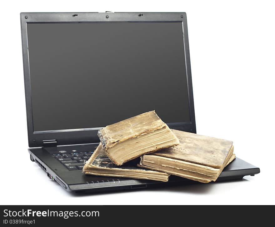 Old worn book with a laptop for your design. Old worn book with a laptop for your design