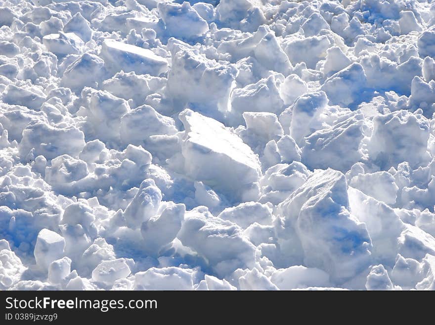 Crust of frozen pile with clumps of snow. Crust of frozen pile with clumps of snow