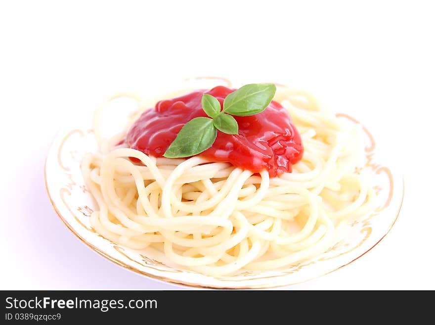 Spaghettis with sauce of tomatoes on a plate