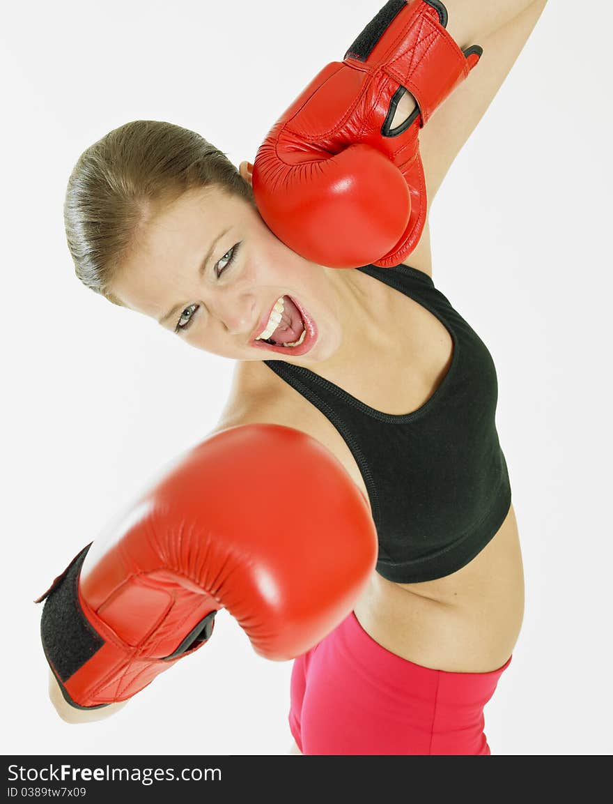 Portrait of young woman with boxing gloves