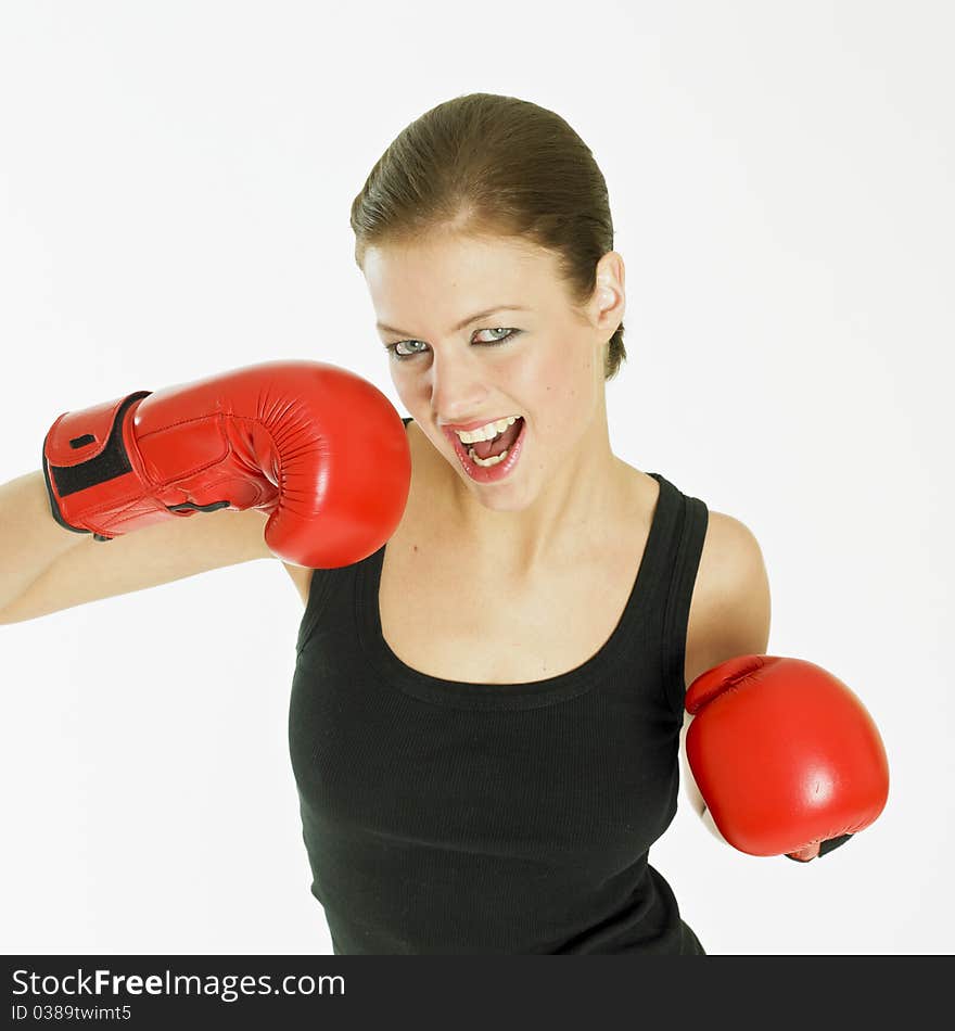 Portrait of young woman with boxing gloves