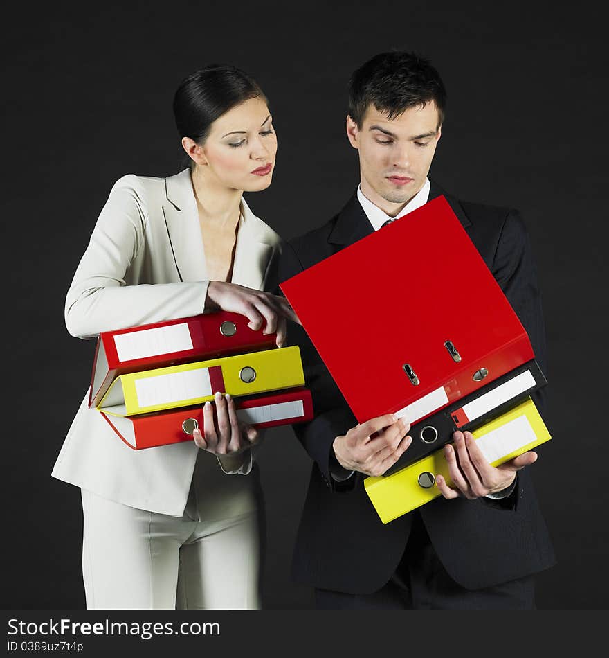 Businesswoman and businessman during their work. Businesswoman and businessman during their work