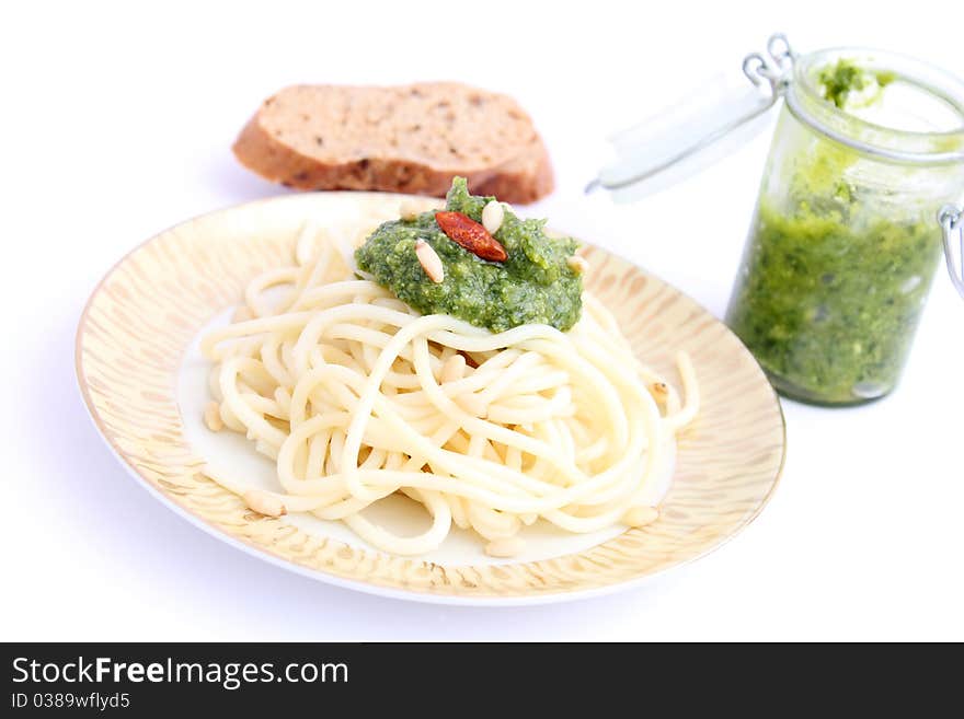 Spaghettis with pesto on a plate