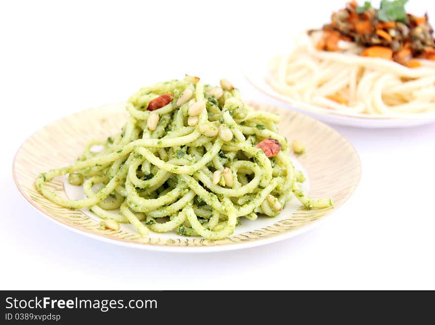 Spaghettis with pesto on a plate