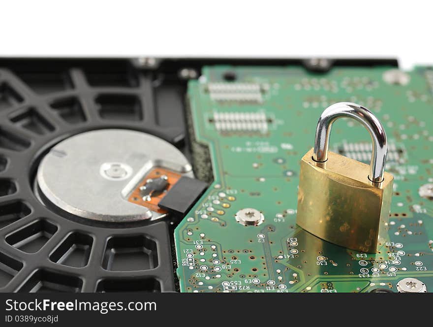 Padlock Sitting On Computer Hard Disk Drive