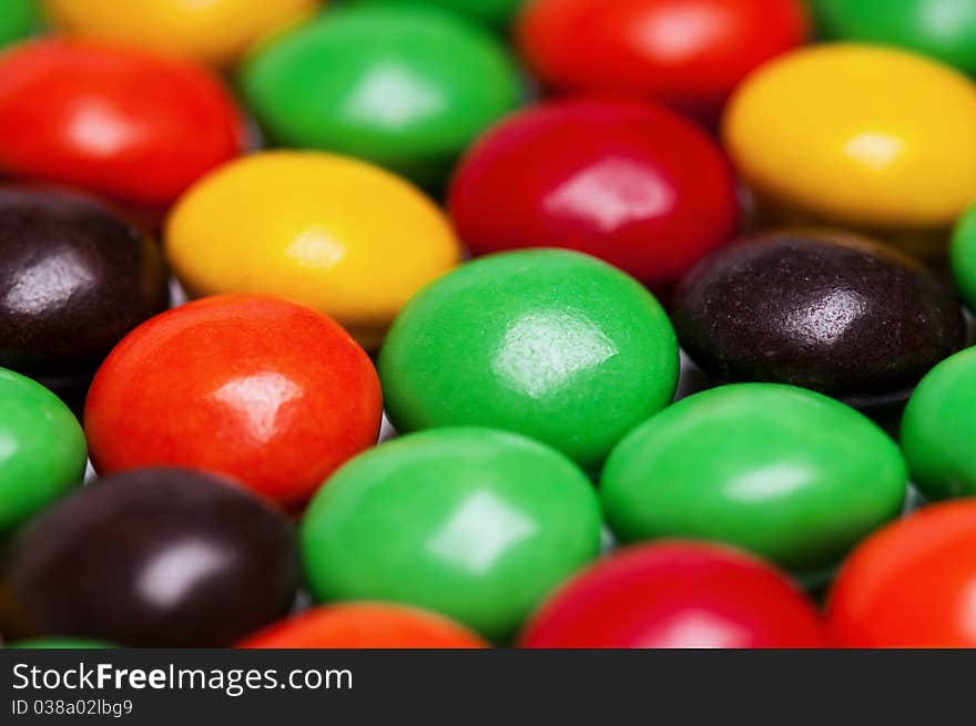 Background of colorful candies coated chocolate sweets