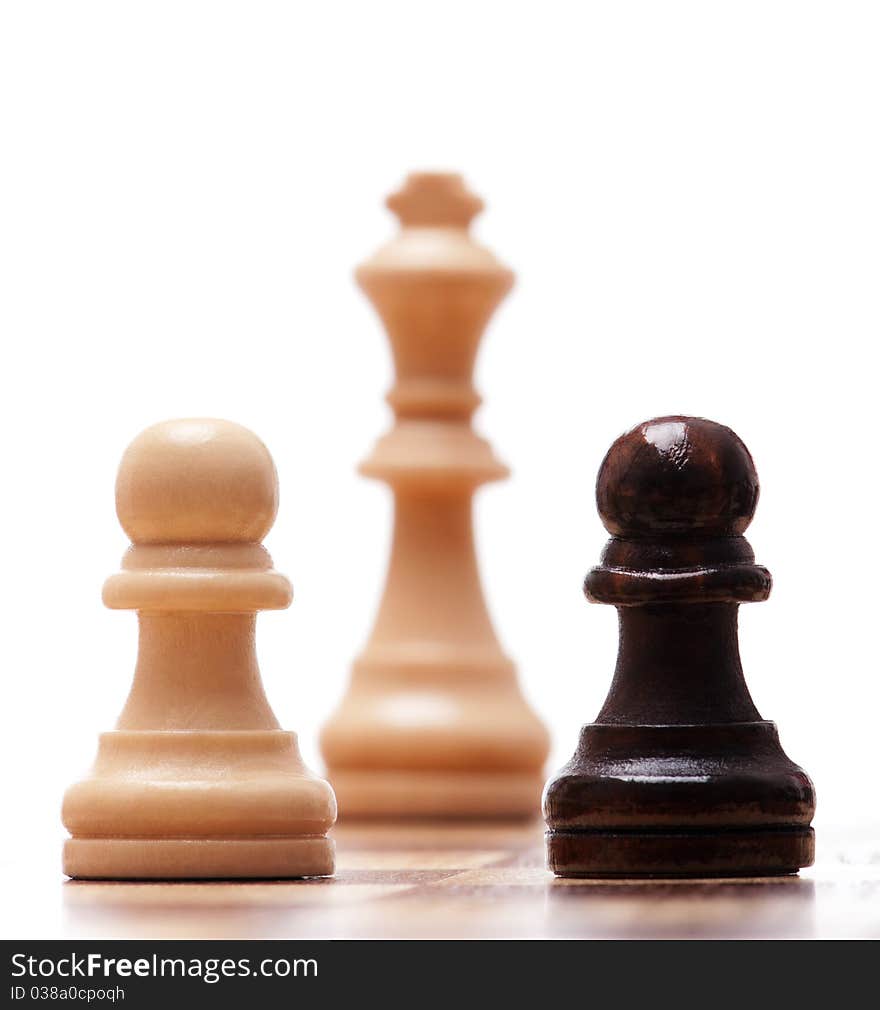 Black and white chess pieces isolated on a white background