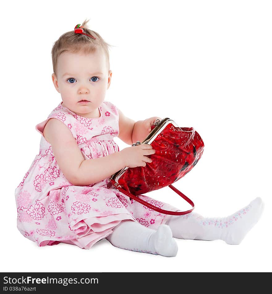 Little girl with shopping bag isolated on white