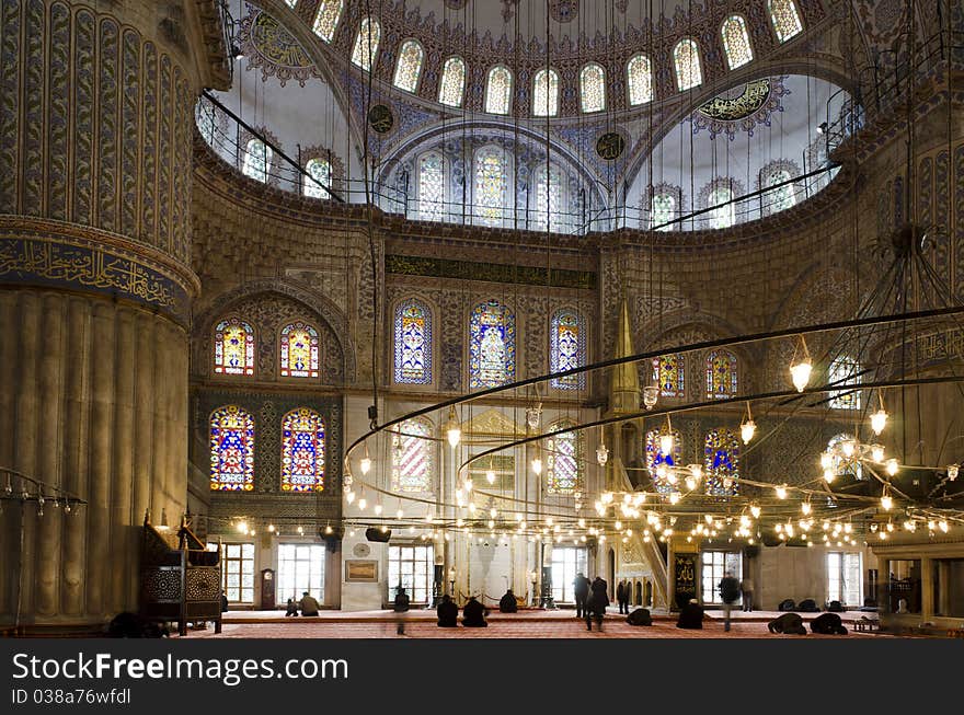 People praying in Blue Mosque, Istanbul, Turkey