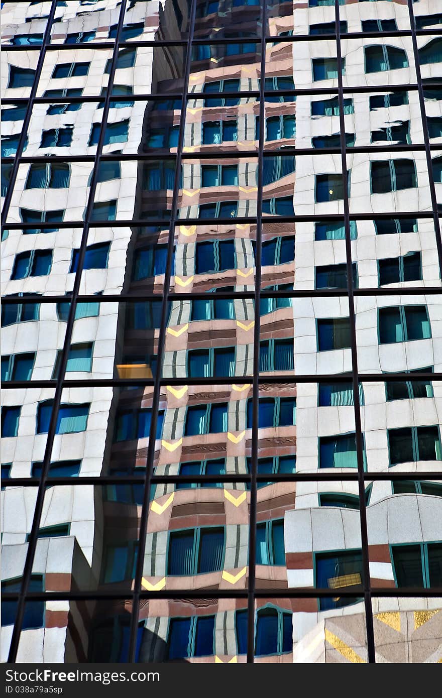 Reflections Of Buildings In Skyscraper Windows