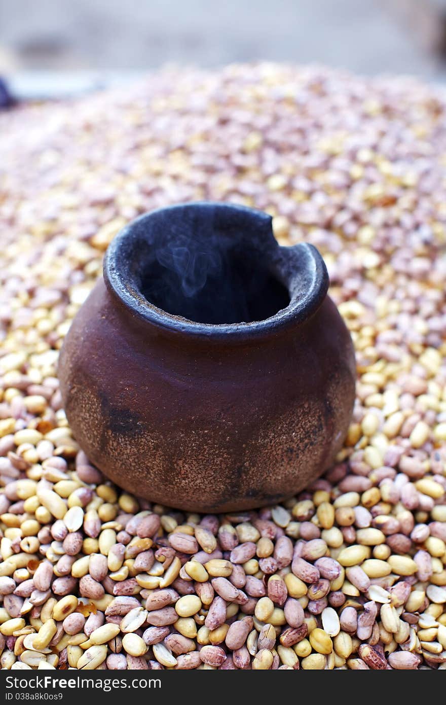 Peanuts or groundnut roasting traditional way in India