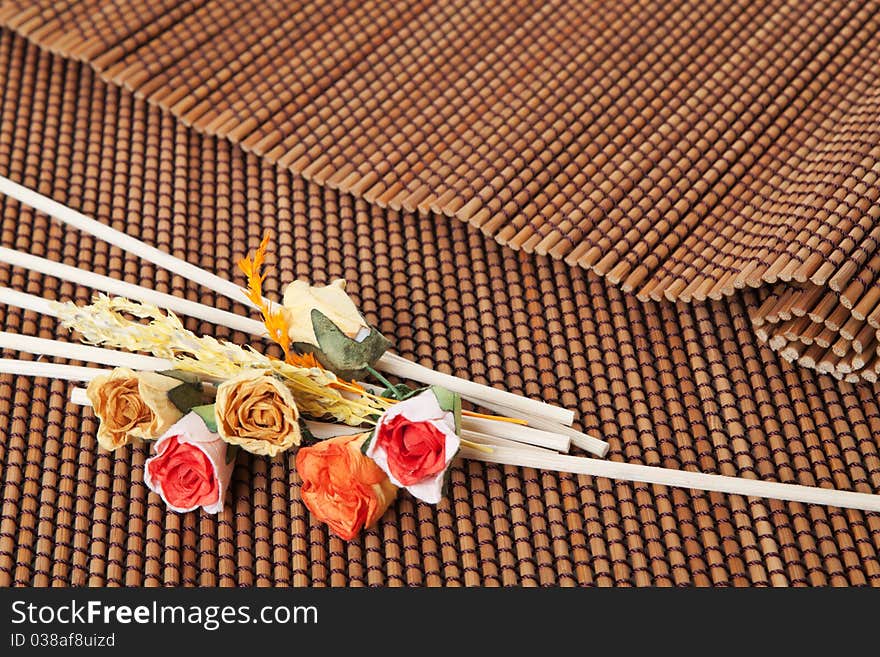 Brown mat and small dry flowers. Brown mat and small dry flowers