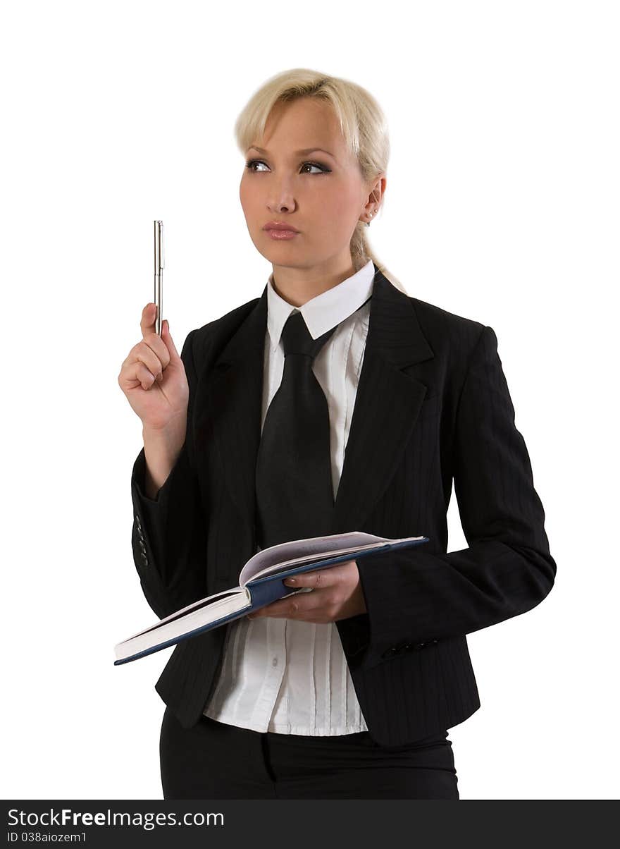 Thoughtful girl in a trouser suitwith a pen and organizer. Thoughtful girl in a trouser suitwith a pen and organizer.