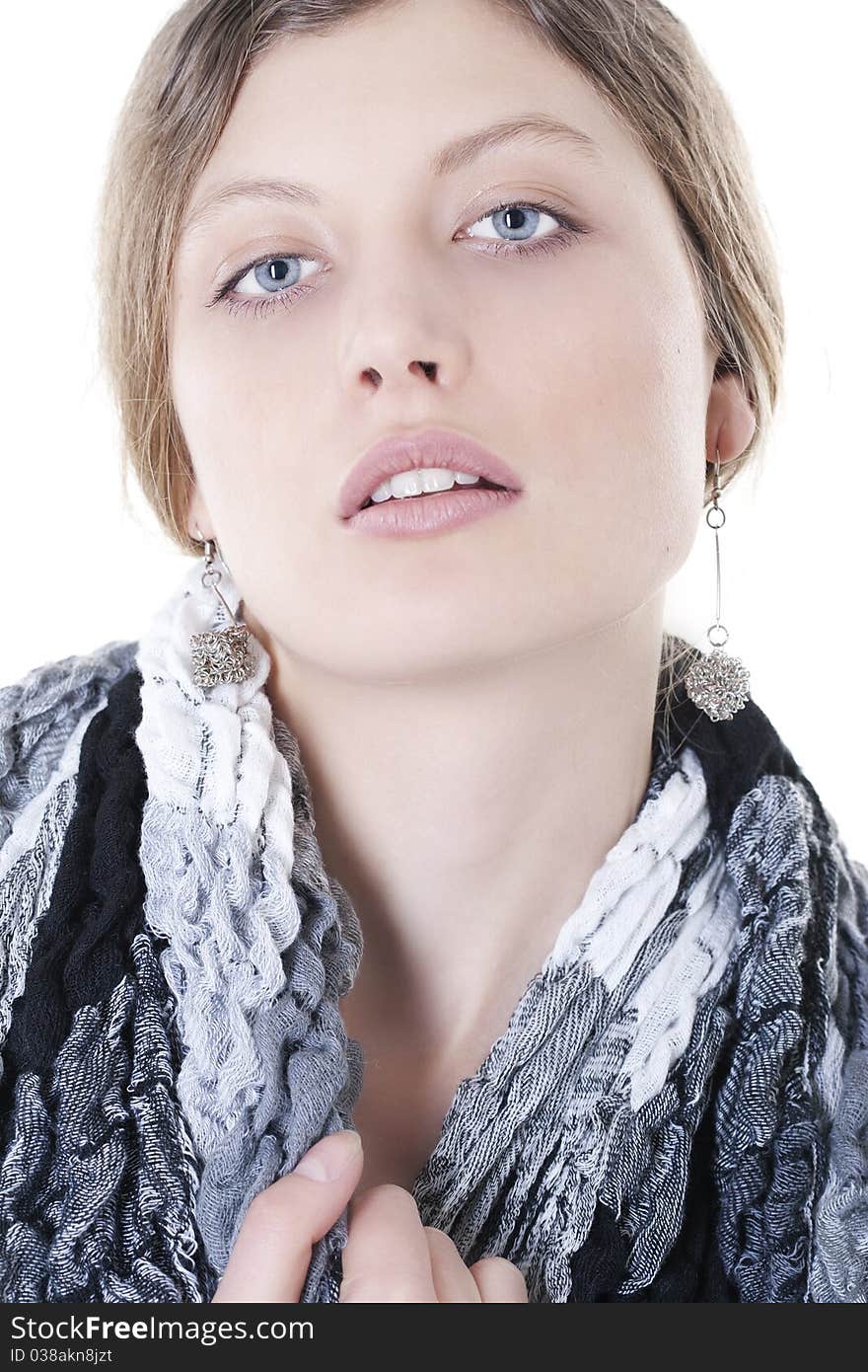 Fashion model posing in scarf on a white background. Fashion model posing in scarf on a white background