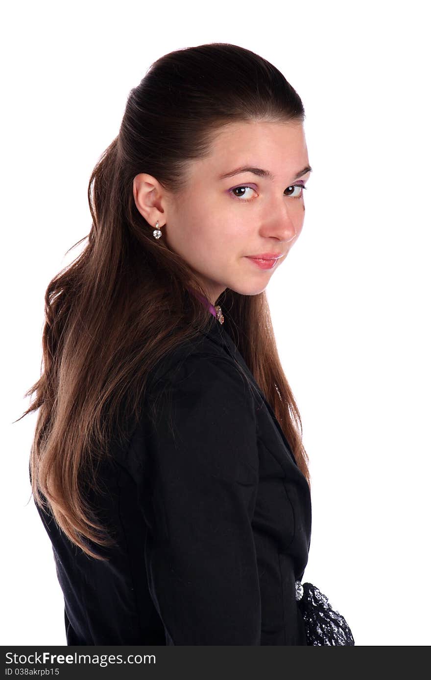 Girl in black suit posing side-view. Isolated on white.