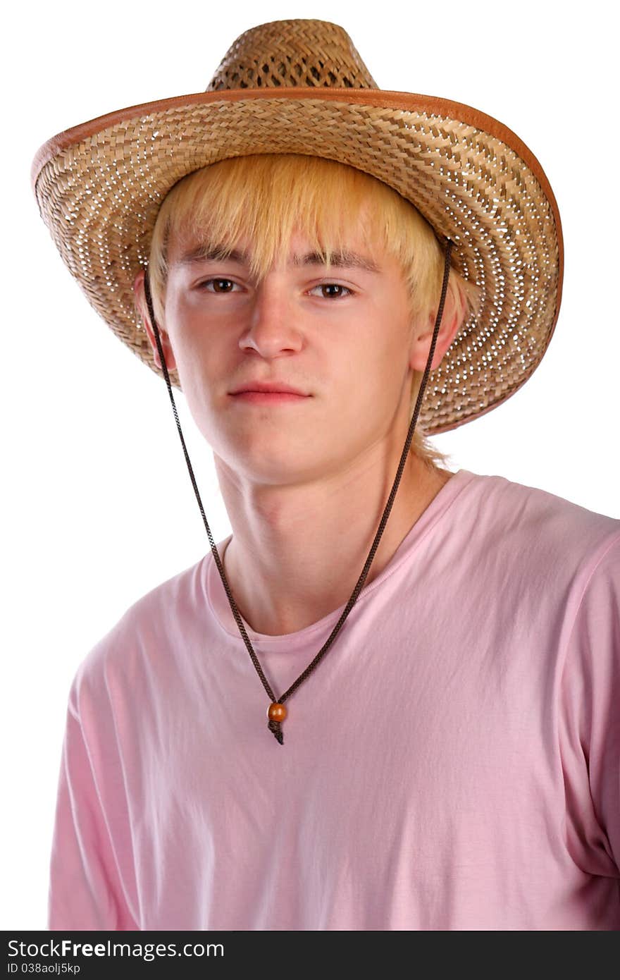 Young man in pink shirt and cowboy hat