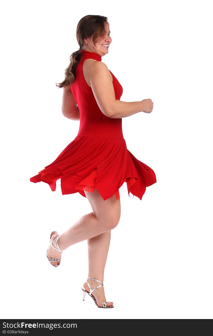 Chubby girl in red dress dancing