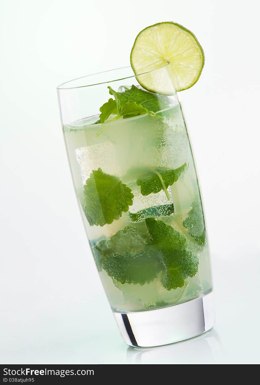 Mojito cocktail with lime closeup