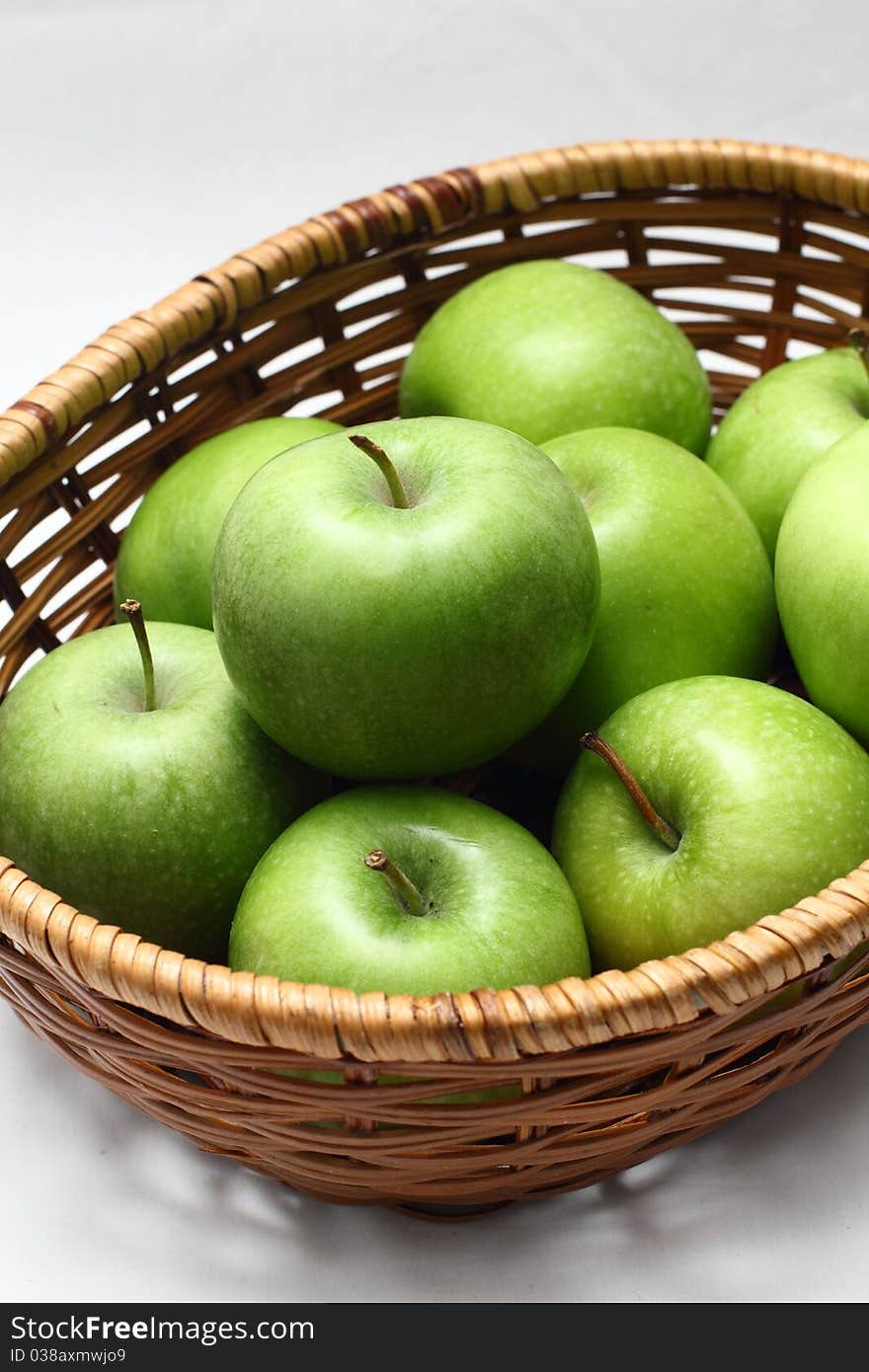 Basket of green apples