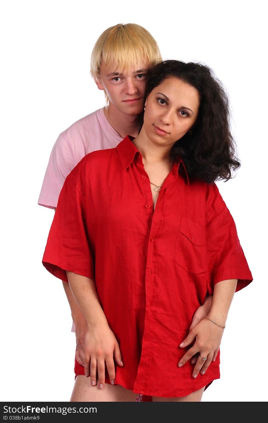 Young man embrace girl in red male shirt