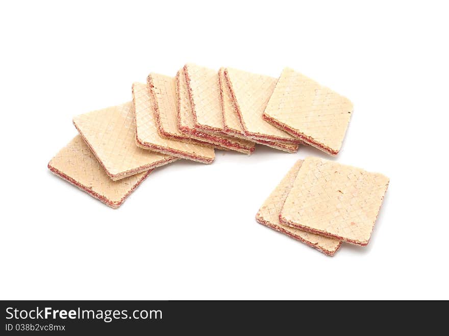 Wafers with an apricot layer on a white background