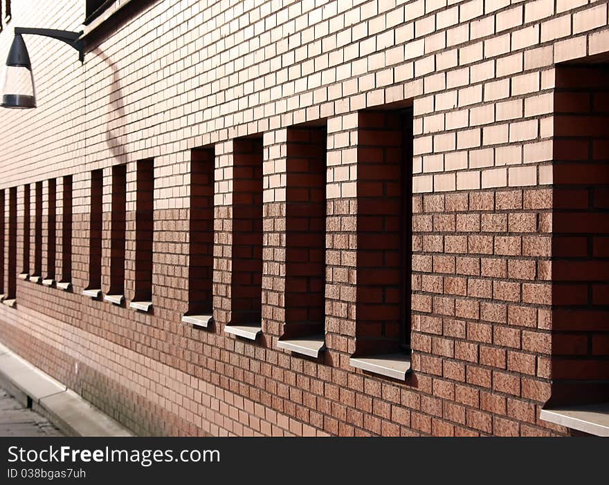 Brown brick wall during the sunset