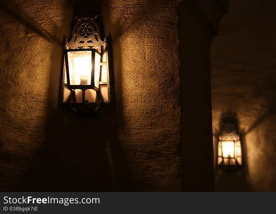 Lamps in an old building's wall. Lamps in an old building's wall