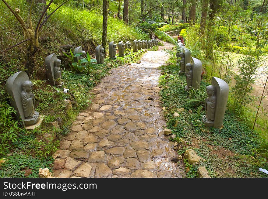 Stone Figures in Meditation in Japanese Garden. Stone Figures in Meditation in Japanese Garden