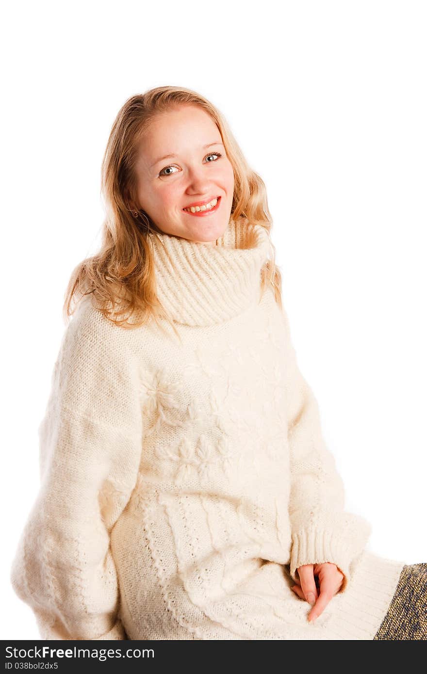 Woman in a sweater on a white background