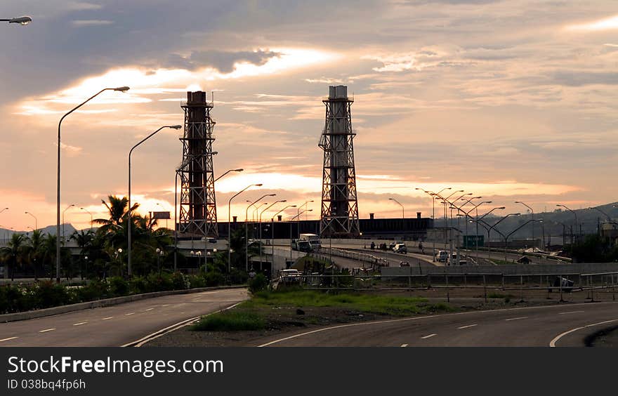 A landscape of an industrial plant on a twilight. A landscape of an industrial plant on a twilight