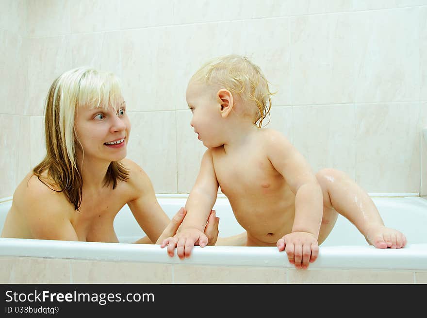 Mother and her son in the bathroom. Mother and her son in the bathroom